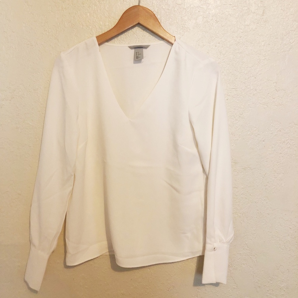 White formal top.